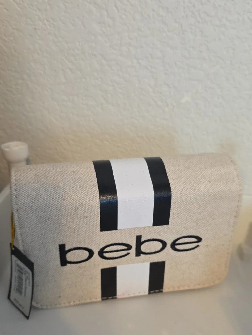 bebe Cream and Black Striped Cosmetic Case